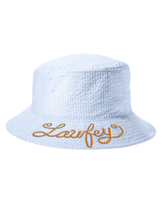 A blue seersucker bucket hat with the brand name 'Laufey' embroidered in gold on the front.