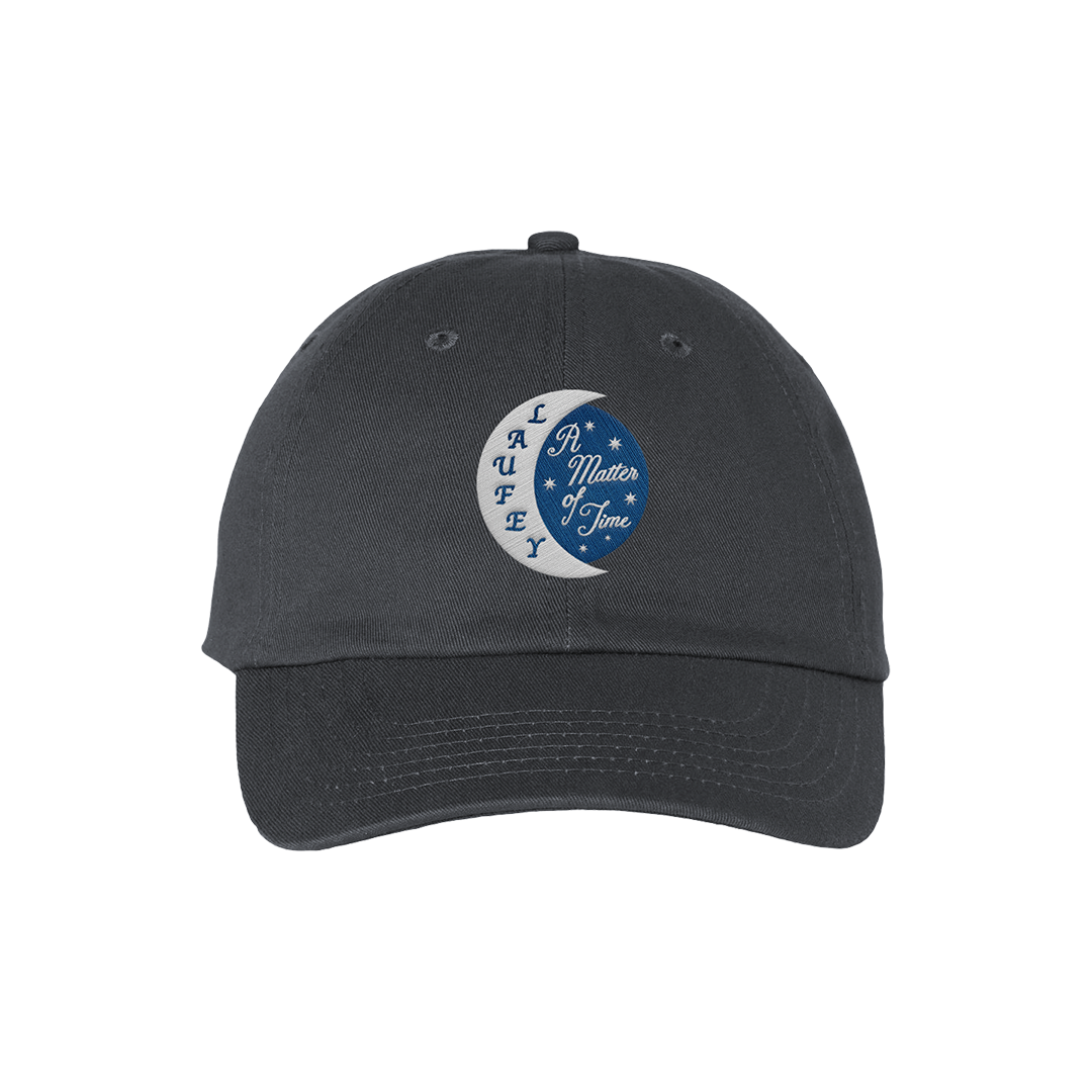 Navy blue embroidered hat with the text 'A Matter of Time' and a moon and stars motif on the front.