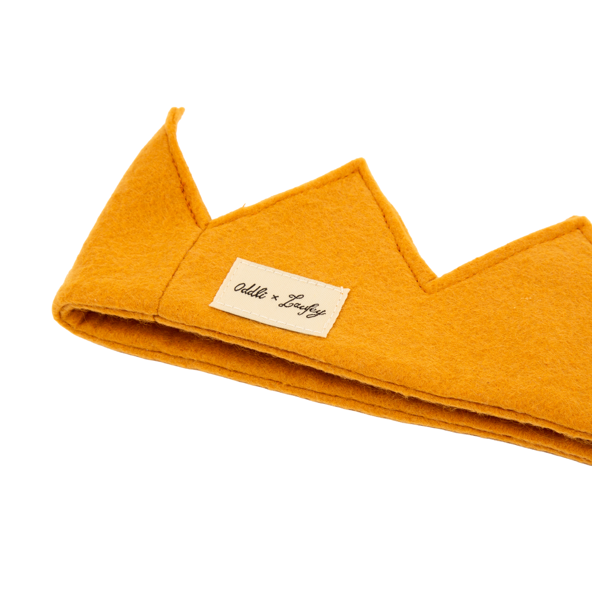Mustard yellow pet bed with a brand label on a white background
