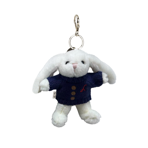White plush bunny keychain with a navy sweater on a white background