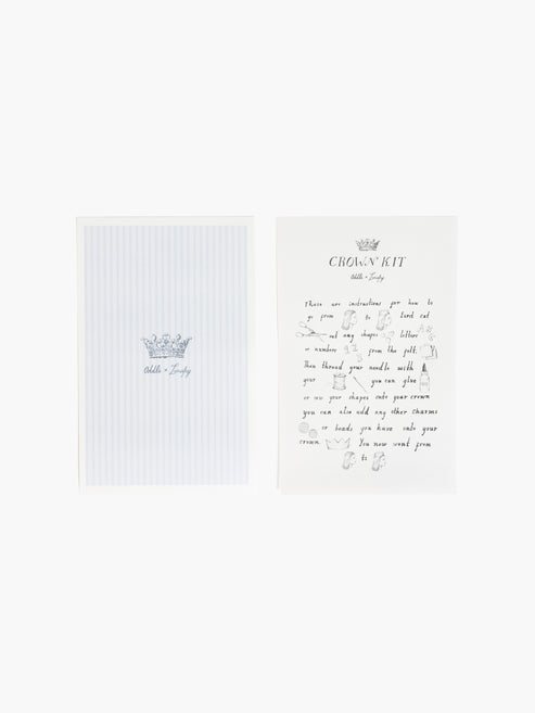 White card with text and a small crown illustration on a white background