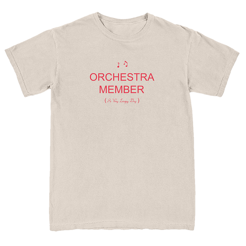 A light beige crewneck t-shirt with red printed text reading 'ORCHESTRA MEMBER (It's So Easyly Fun)' on the chest, displayed flat against a white background.