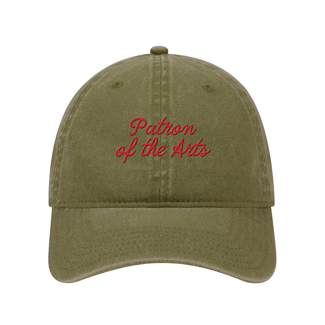 An olive green washed cotton baseball cap with red embroidered text reading 'Patron of the Arts' on the front, shown against a plain white background.
