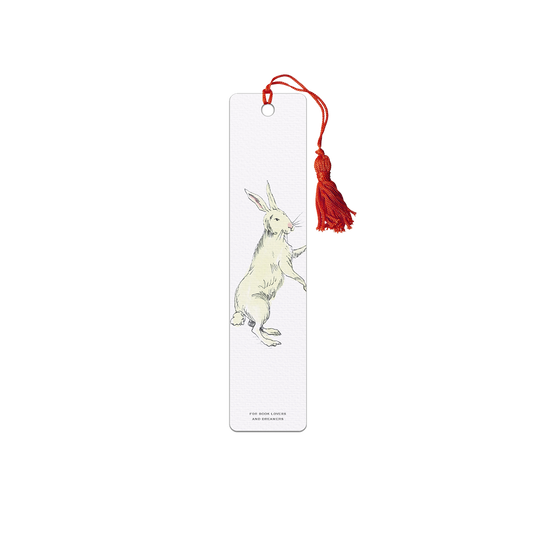 A felt bookmark with a tassel featuring an illustration of a rabbit on it.