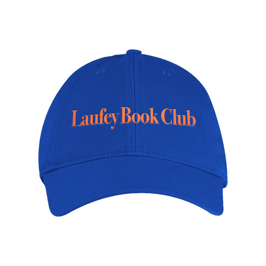 A royal blue baseball cap with 'Laufey Book Club' embroidered in orange across the front, shown against a plain white background.