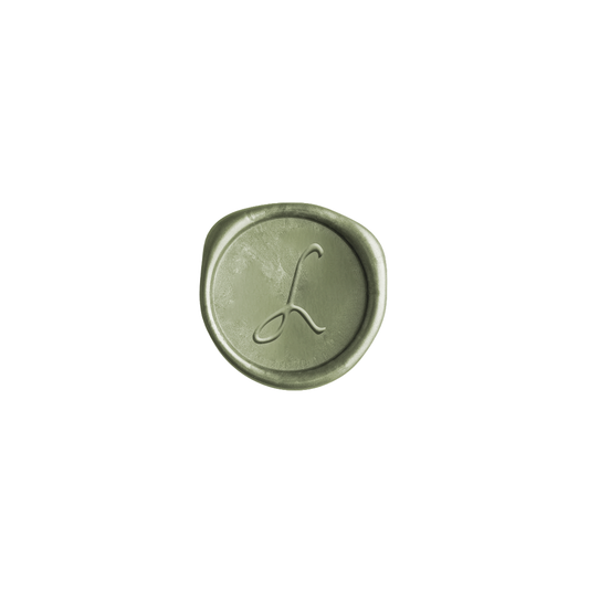 A single oval wax seal with a monogram letter 'L' in the center, shown on a plain white background.